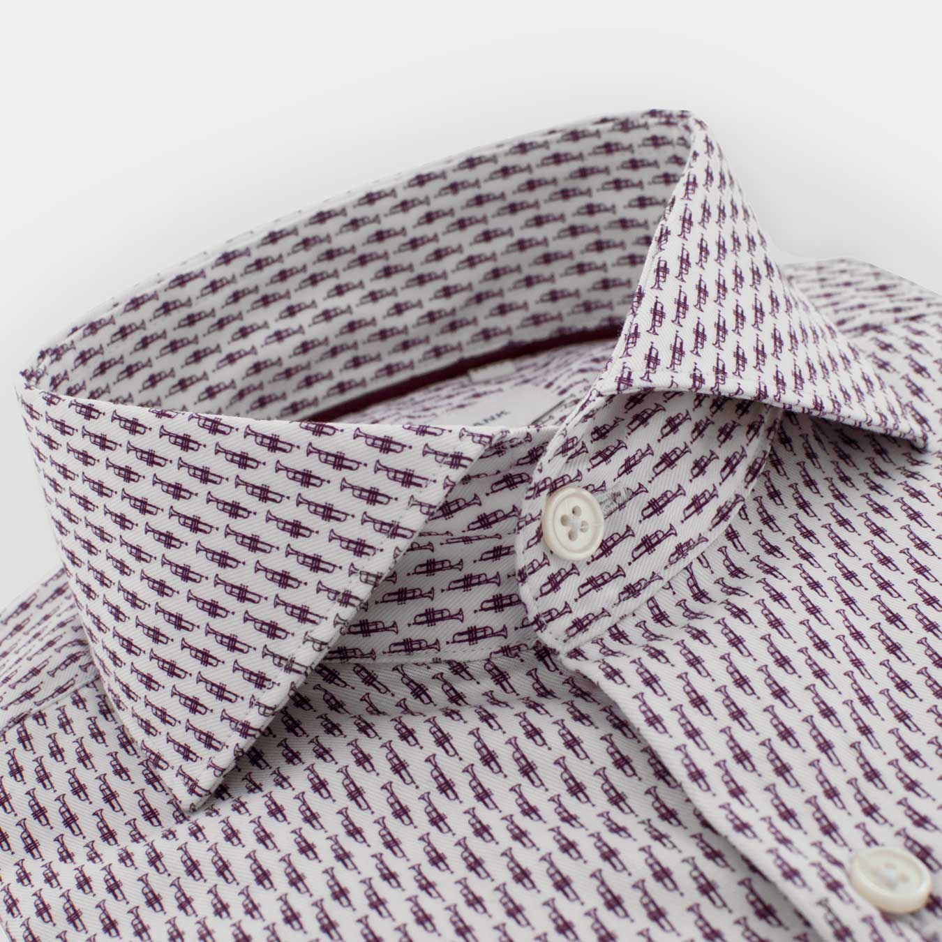 CAMISA BLANCA CON ESTAMPADO DE TROMPETAS - H&F - COLECCION -